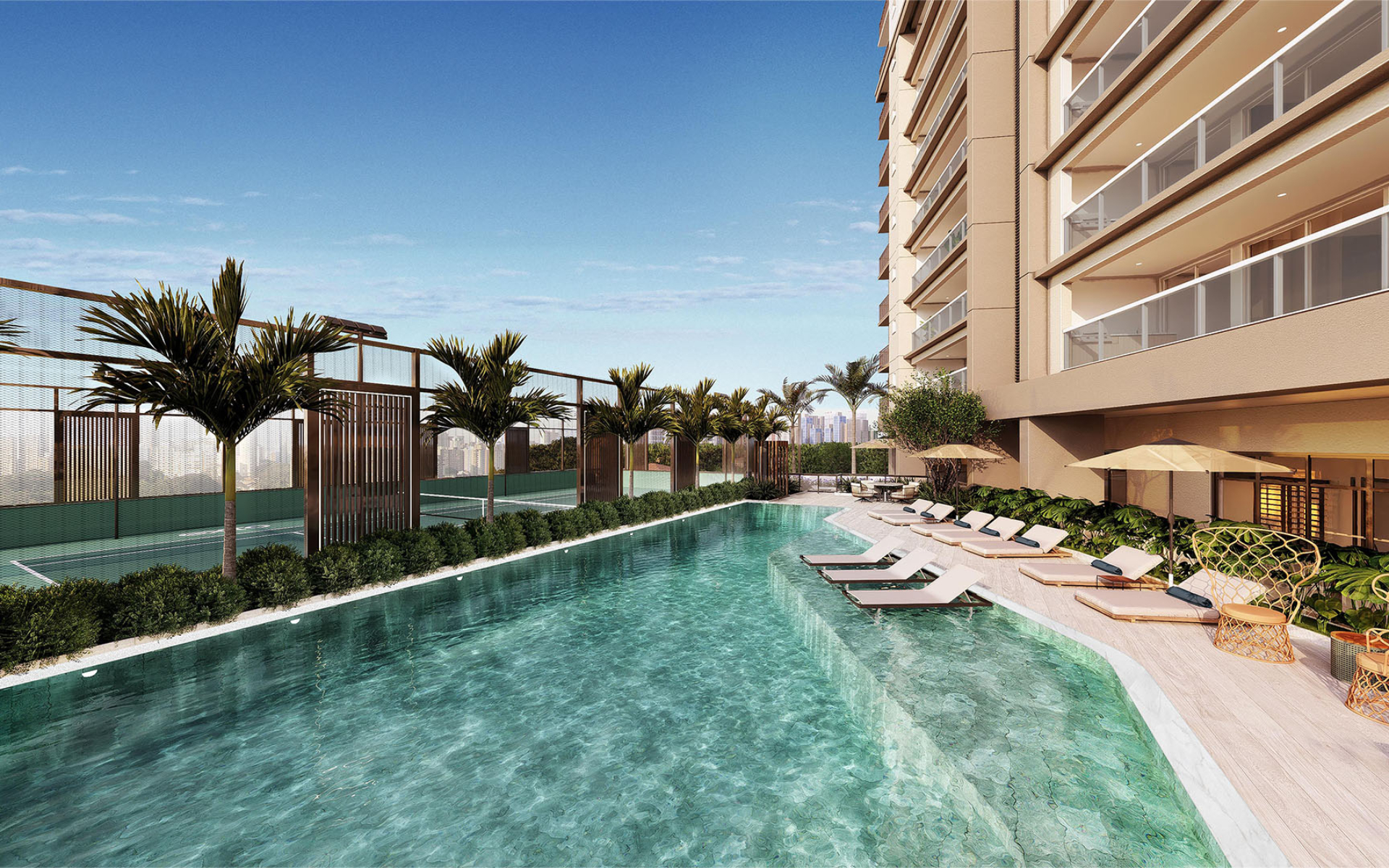 Piscina descoberta com deck molhado e solário